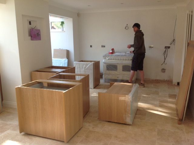 Image of Making a start on laying out the kitchen units, our kitchen fitting team can get to work